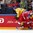 MOSCOW, RUSSIA - MAY 17: Russia's Alexei Yemelin #74 takes out Sweden's Alexander Wennberg #41 along the boards during preliminary round action at the 2016 IIHF Ice Hockey World Championship. (Photo by Andre Ringuette/HHOF-IIHF Images)

